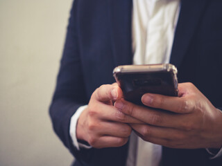 close up of business man using smartphone, concept of technology for business, network online.