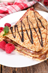 crepe with chocolate and raspberry