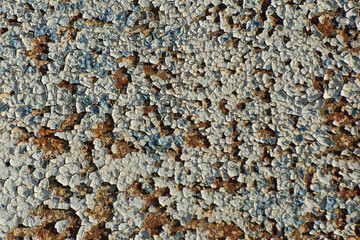 Old paint on a metal surface.
