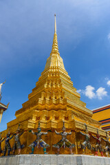 Fototapeta na wymiar The base of Phra Suvarnachedi has figures of monkeys and giants supporting the chedi, is situated to the east of the terrace of Wat Phra Kaew (Wat Phra Si Rattana Satsadaram), Bangkok, Thailand.