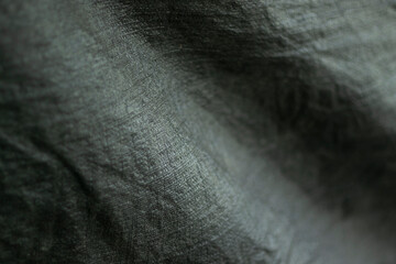 Fototapeta premium Cloth black and slightly jagged abstract background