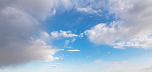 Naklejka na ściany i meble Beautiful blue sky and white clouds. Nature background. Sky clouds.