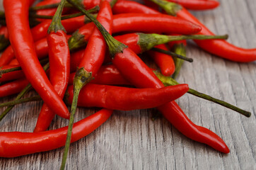 Red Chillies on wooden