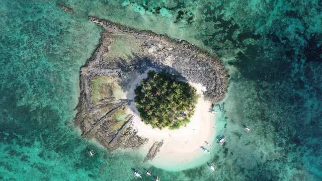 Birds Eye Aerial View of Small Uninhabited Guyam Island in Siargao Archipelago, Philippines