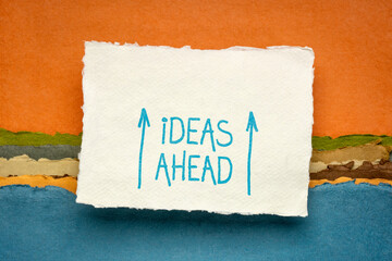ideas ahead - sketch and handwriting on a handmade paper against abstract landscape, creativity concept