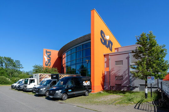 ROSTOCK, GERMANY - JUNE 14, 2020: Sixt rental office. Sixt SE is a European multinational car rental company with about 4,000 locations in over 100 countries.