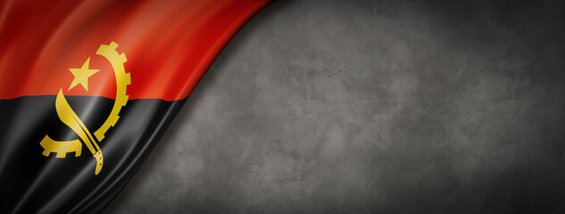 Angolan flag on concrete wall banner