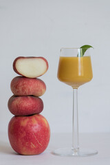 glass of juice and fruits