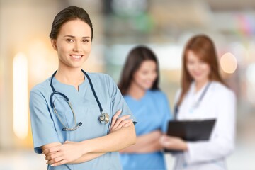 Group of doctors against the medical team background