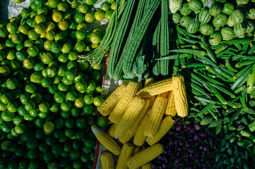 close up of corn,lemon,eggplant.vegetable in the market for sell.top view