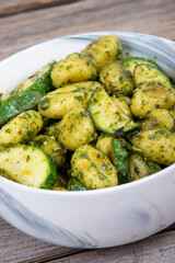 potato gnocchi pasta with zucchinis and fresh pesto