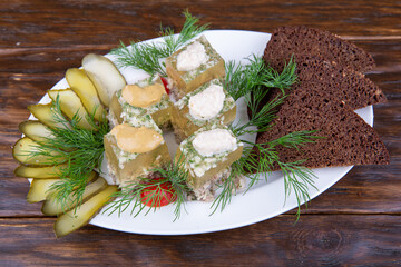 Homemade cold, served with black bread and pickles
