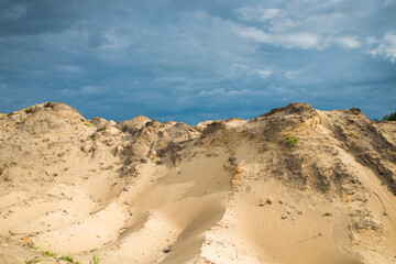 Naklejka premium Sand quarry. Texture. Traces of production.