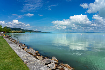 simple picture about Lake Balaton in Hungary from Badacsony beach with blue sky and cloud refletion...