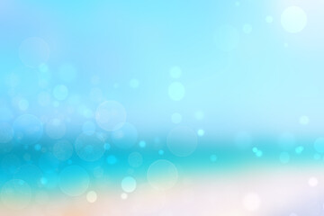Abstract sea background. Abstract tropical sandy summer beach background with bokeh lights on light blue sky and sun. Beautiful texture. Space.