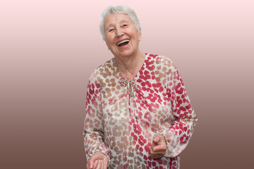 The portrait of a cheerful senior woman