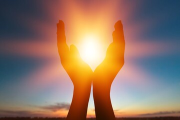 Female hands holding lights of setting sun