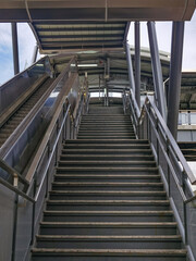Architecture construction of elevator, escalator stairs and sky walk way, walk bridge between sky train station and department store mall