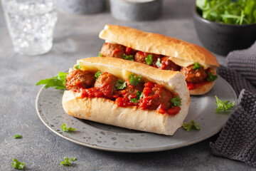 meatball sub sandwich with cheese and marinara tomato sauce. american italian fast food