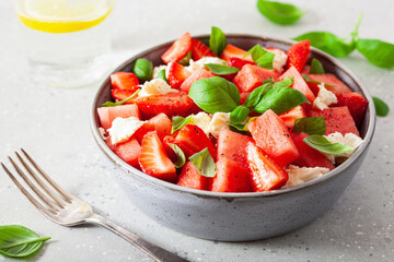 watermelon salad with strawberry mozzarella cheese basil. healthy summer dessert