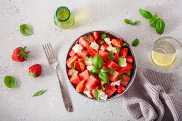 watermelon salad with strawberry mozzarella cheese basil. healthy summer dessert