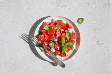 watermelon salad with feta cheese and basil. healthy summer dessert