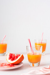 Grapefruit and orange juice, summer refreshing citrus drink
