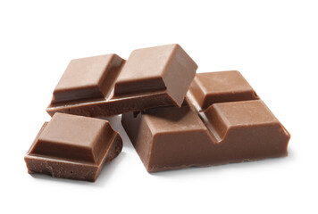 Pieces of delicious milk chocolate isolated on white
