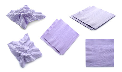 Set with violet paper napkins on white background