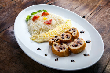decorated plate for children, wooden background
