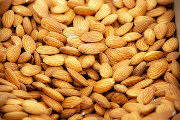 Dried almond seeds in the grocery stock