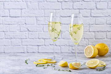 Homemade lemonade made from lemons and thyme.