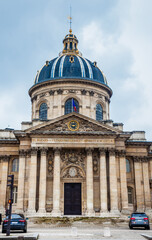 Fototapeta na wymiar Dome of the Institute of France in a freezing winter day in Paris