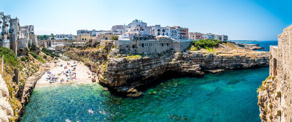 Panorama view of the rocky peninsula and the entrance to the coastal inlet at Polignano a Mare, Puglia, Italy