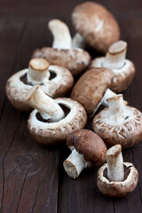 Fresh whole  button mushrooms - champignon , close-up selective focus