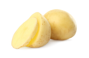 Whole and cut fresh raw organic potatoes on white background