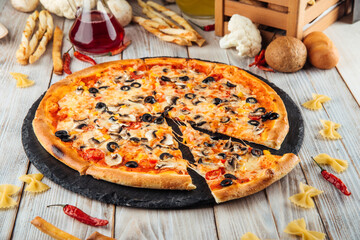 Capriccioso Italian sliced pizza olives mushrooms