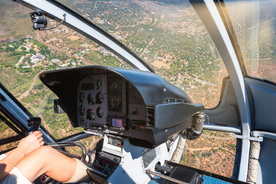 View from inside helicopter flying nearby Victoria Falls