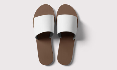 Brown and white slippers on a white background