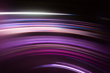 Full frame abstract image of purple light trails