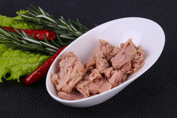 Tasty canned tuna fish in the bowl