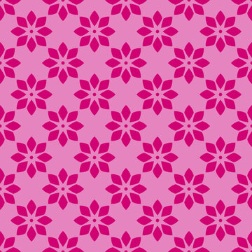 Red floral pattern on pink seamless design backdrop. © TOMARILLO
