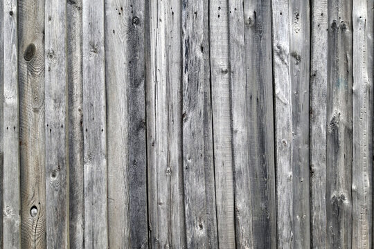 Weathered wooden wall texture. Old wooden fence. Background of old retro vintage aged texture. Gray boards.
