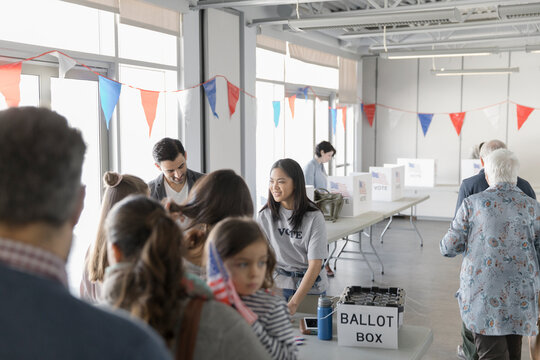 People Checking In At American Polling Place