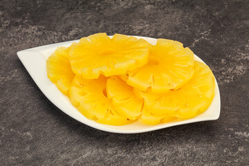 Marinated pineapple rings in the bowl