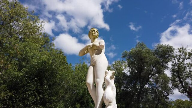 Venus Statue in a Garden,classic Venus do milo statue in  a beautiful garden.