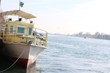 Old roar boat on River. Azerbaijan