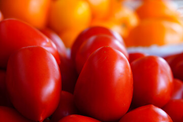 Fresh red tomatoes at a farmers market