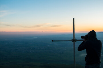 photographs at the top of the mountain