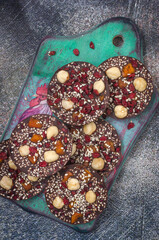Homemade chocolate with hazelnuts barberry and dried apricots